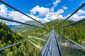 Suspension Bridge at Reutte between two hills in beautiful landscape Scenery of Alps, Tirol, Austria