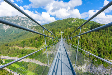 Suspension Bridge at Reutte between two hills in beautiful landscape Scenery of Alps, Tirol, Austria