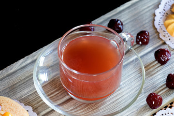 Strawberry Tea Gooseberry Cupcake and Cookie on Black Background