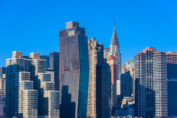 Obraz na płótnie Canvas View from East Side River to Empire State Building - Manhatten Skyline of New York, USA