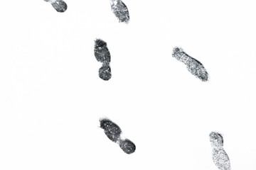 Clear deep footprints on white background. Isolated footprints.