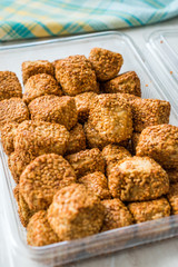 Turkish Salty Bakery Bagel Balls Kahke Simit with Sesame Seeds / Salted Snacks in Plastic Cup Package or Container.