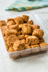 Turkish Salty Bakery Bagel Balls Kahke Simit with Sesame Seeds / Salted Snacks in Plastic Cup Package or Container.