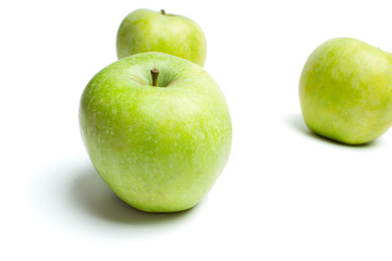Green apples isolated on white background.