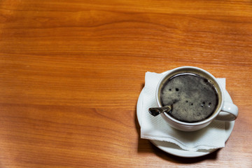 Cup of coffee on a saucer