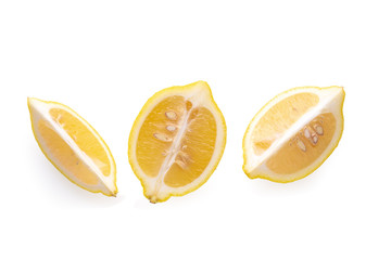 Ripe slice of yellow lemon citrus fruit isolated over white background