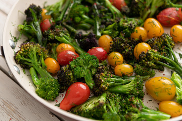 Green Broccoli Florets Sauteed with Heirloom Cherry Tomatoes and Fresh Herbs
