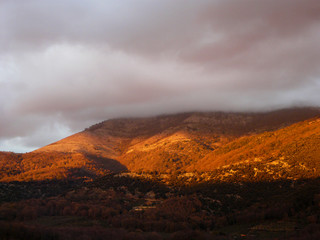 mountain at sunset in the clouds