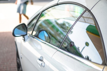 Car on the road. Transport and its doors and reflection in glass. Stock photos for design