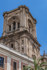 Bell tower of Roman Catholic Granada Cathedral or Cathedral of Incarnation (Catedral de Granada, Santa Iglesia Catedral Metropolitana de la Encarnacion de Granada, 1561). Granada, Andalusia, Spain.