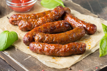 Grilled sausages with meat (beef, pork, lamb) and spices, hot merguez, kabanos, chorizo. Delicious...