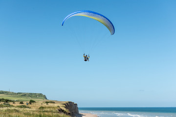 Paragliding above the cliff