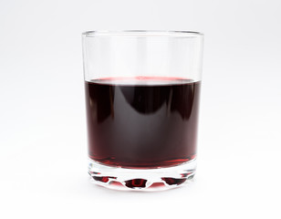 Wine in a glass on light background. Selective focus.