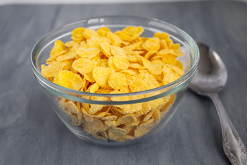  Corn flakes and cover. Quick breakfast. Blue background