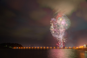 Japanese fireworks over the sea with composition.