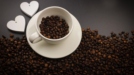 Fototapeta na wymiar Coffe cup with coffee beans