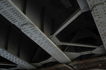  Steel structures in gray, metallic beams with rivets. Industry