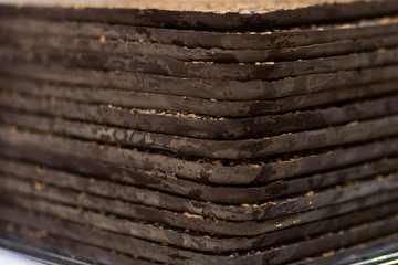 Chocolate store in Budapest. Brown Slices of Chocolate with very much nuts