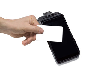 Paying with contactless credit card at payment machine. Closeup, mockup white credit card for design.