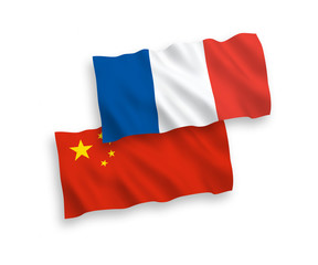 National vector fabric wave flags of France and China isolated on white background. 1 to 2 proportion.
