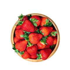 Sweet fresh juicy organic ripe strawberries in wooden bowl isolated on white. View from above.