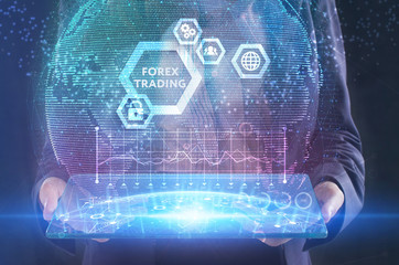 The concept of business, technology, the Internet and the network. A young entrepreneur working on a virtual screen of the future and sees the inscription: Forex trading