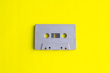 retro of tape cassette on yellow background. soft focus.