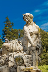 Fototapeta na wymiar A beautiful fountain in the Jardin de la fontaine in Nimes, France