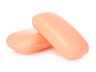 Pieces of orange soap isolated on white background.