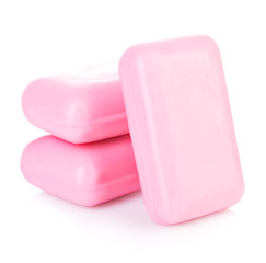 Pieces of pink soap isolated on white background.