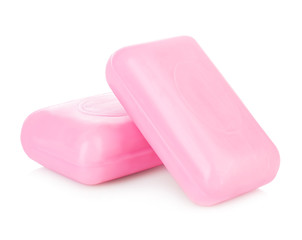 Pieces of pink soap isolated on white background.