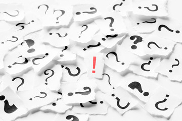 Pile of question mark signs scattered around