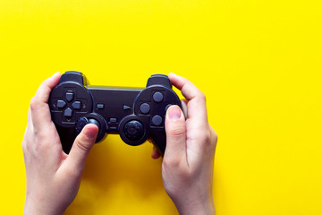 Vertical view of hands with gamepad