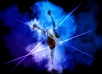 Man break dancing on smoke background