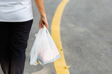 Obraz na płótnie Canvas Carry Plastic Bags in Daily Life