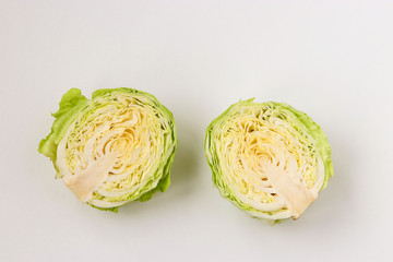 Obraz premium Cabbage halves are located on a white background