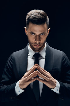 Concentrated business man make sinister plans