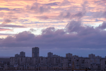 Sunset clouds over the city