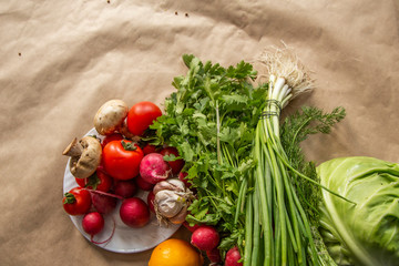 Healthy food background. Assortment of fresh vegetables on paper background