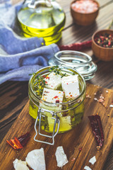 Feta cheese marinated in olive oil with spices
