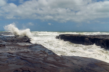 Stormy Waves Splash, Muriwai Cliffs, New Zealand