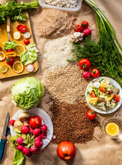 Organic food background with cutting board and lemon slices