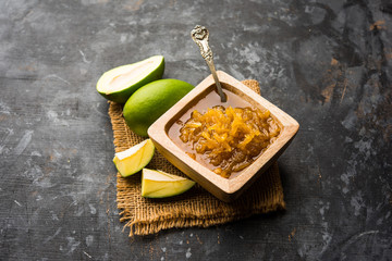 Mango Chunda or Sakhar Amba is a traditional indian summer recipe made using accha aam preserved in sugar syrup for days. selective focus