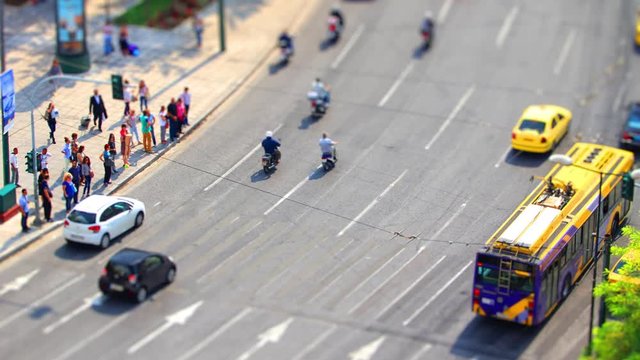 Time lapse of a street adjacent to Syntagma central square in Athens, Greece, during day time with the tilt shift effect