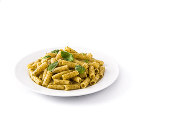 Penne pasta with pesto sauce and basil on a plate, isolated on white backgCopyspaceround.