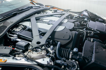 Fototapeta premium The powerful engine of a modern sport car 