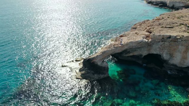 Aerial view of Lovers Bridge on rocky shore of Mediterranean, Cyprus