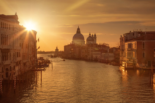 Beautiful sunrise over the canale grande in Venice, italy with the Santa Maria in the background