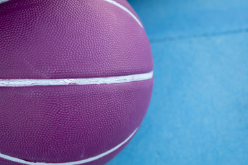 Purple basketball ball with white lines