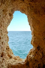 Poster Lichtblauw Natuurlijke rotsen bij Algar Seco in Carvoeiro Algarve Portugal